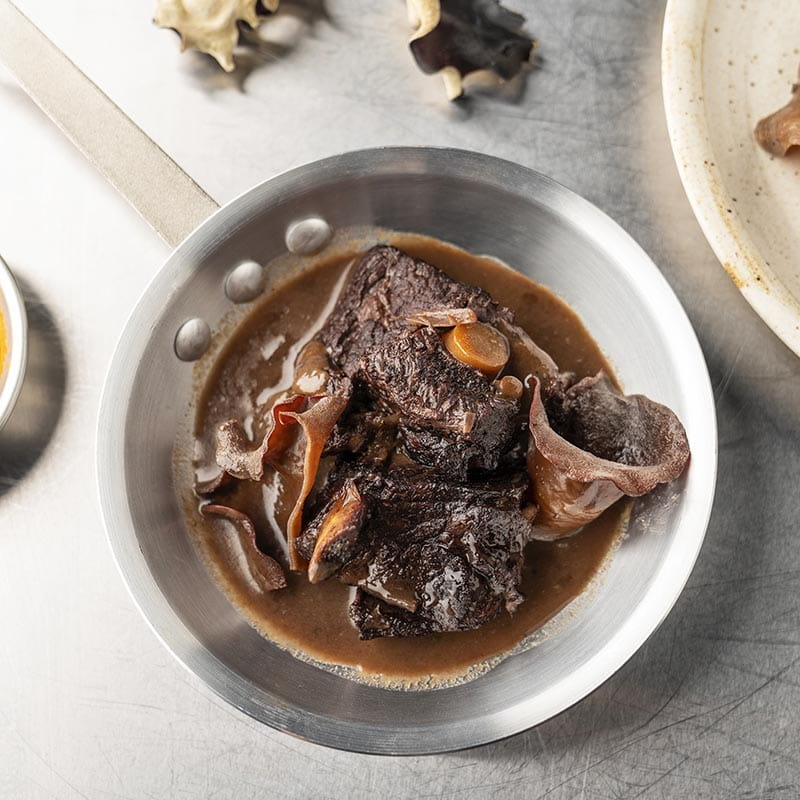 Braised Beef Short Ribs and Trumpet mushrooms Chipotle Cinnamon sauce - Recipe
