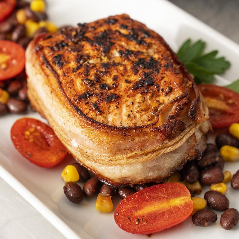 Darnes de saumon grillées enroulées de bacon