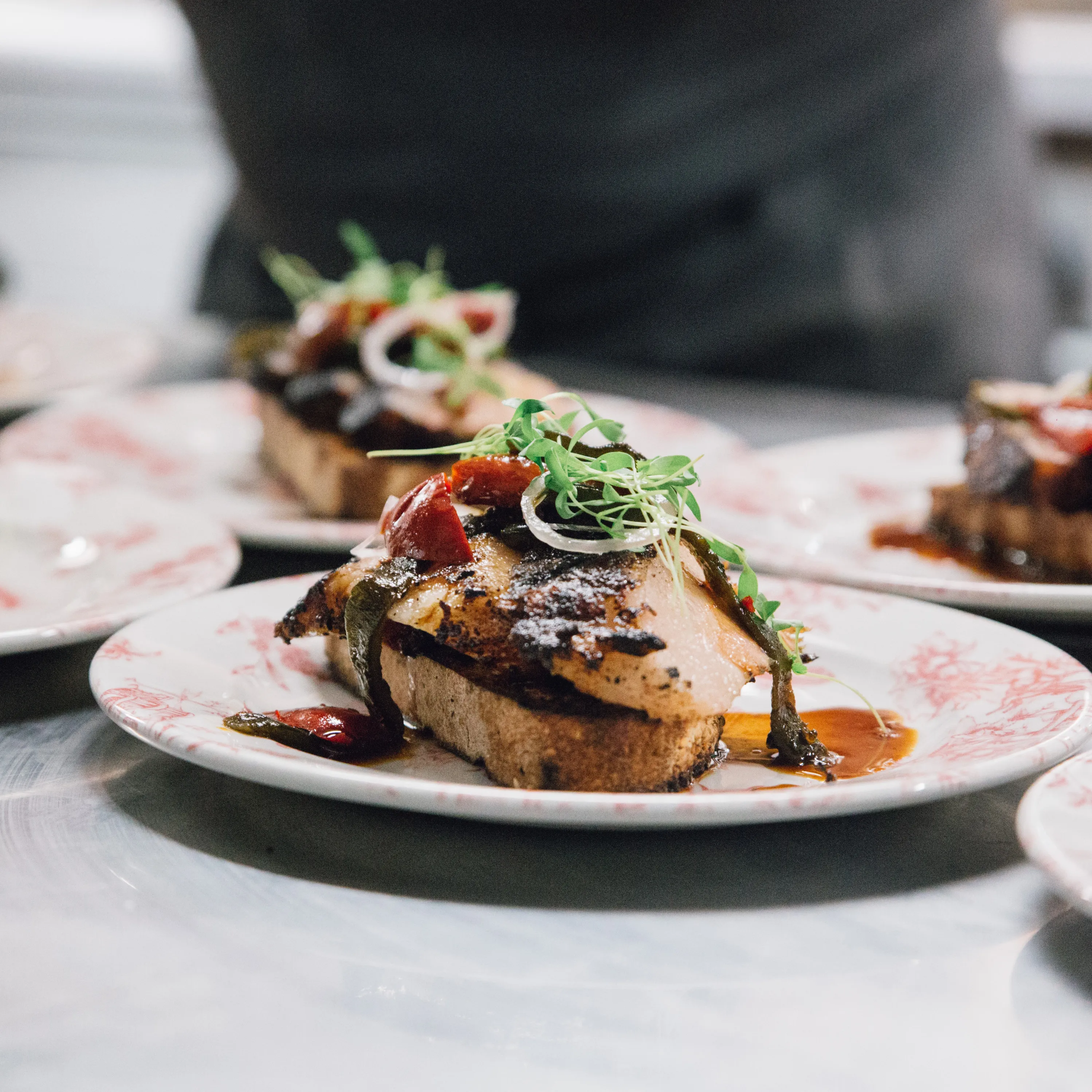 La Grille Wild Whiskey Smoked BBQ Glazed Pork Jowl on Toast Charred Peppers - Recipe
