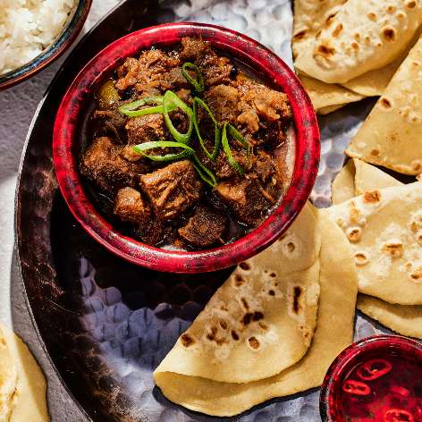 Adobo de porc philippin avec crêpes mandarine